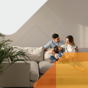 couple with child on sofa