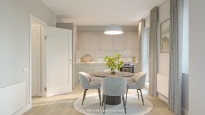 Kitchen and dining area in a home at Millers Glen, with a round dining table and chairs beneath a pendant light