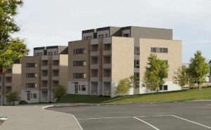 CGI showing the Grange Oaks apartment blocks from the parking court